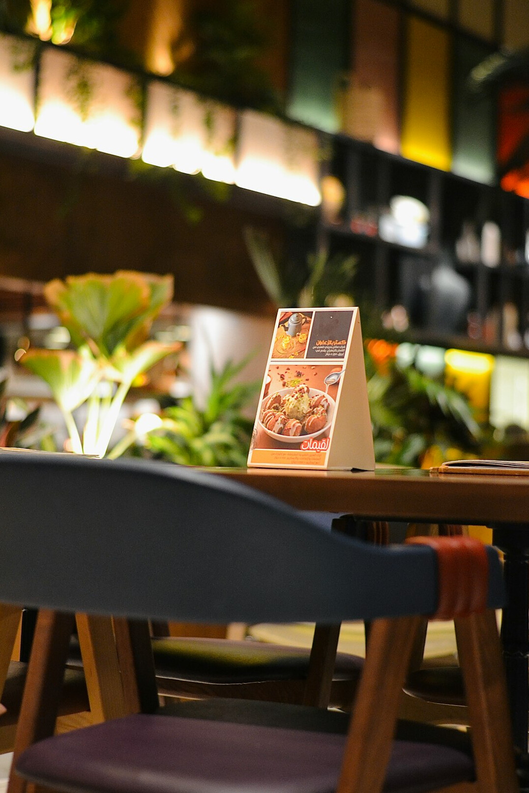 Digital tablet showing an e-book on a cafe table with coffee