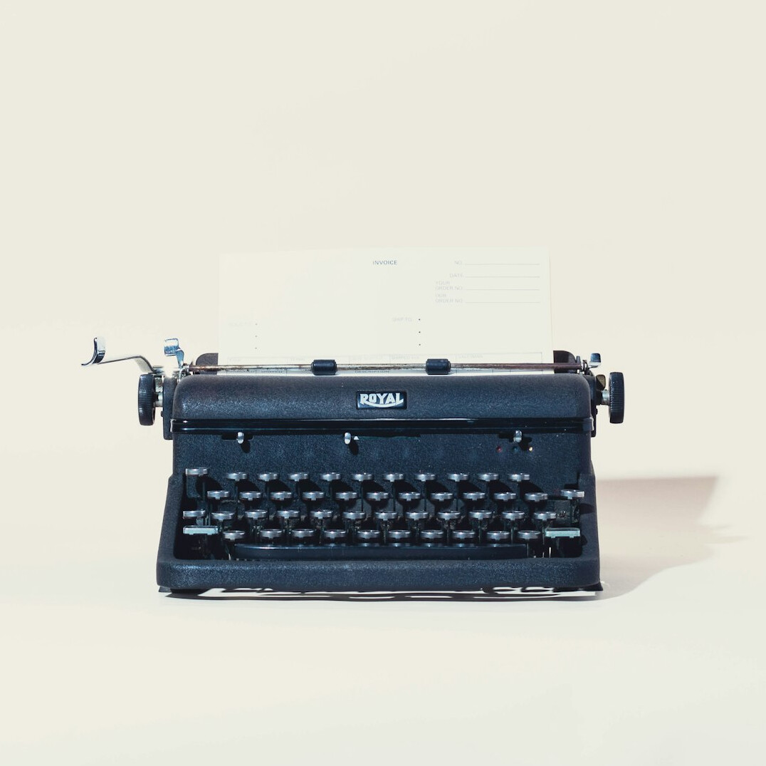 vintage typewriter with paper